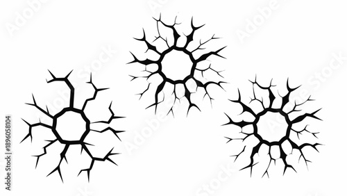 Black cracks resembling lightning or branching tree roots on white