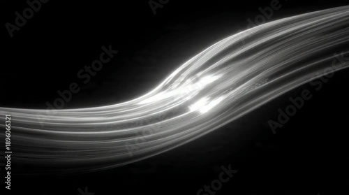 Dynamic white light streaks curving across a dark background, captured from a front viewpoint, showcasing an abstract scene