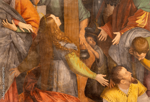 Bild auf Leinwand VERCELLI, ITALY - JANUARY 16, 2026: The detail of renaissance fresco of Crucifixion (Mary Magdelene under the cross) in the church Chiesa di San Cristoforo by Gaudenzio Ferrari (1529 - 1534)
