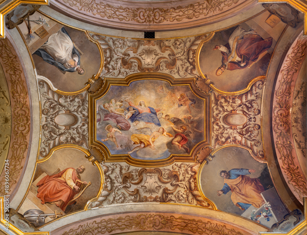 Fototapeta premium VIGEVANO, ITALY - JANUARY 18, 2026: The ceiling fresco of Assumption and the St. Thomas Aquinas, Augustine, Daniel in the church Chiesa di Santa Maria del Popolo by Giovan Battista Garberini (1888).