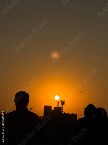 silhouette of a man on the roof