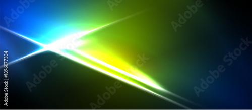 Bright abstract light streaks radiate from central point. Vivid colors blend, creating dynamic visual effect. Dark background emphasizes luminosity.