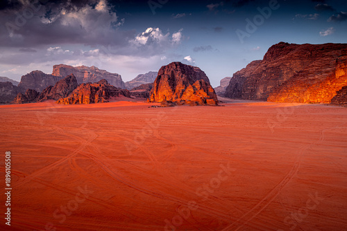 Fotografie Sunset with majestic mountains in red desert, Wadi Rum