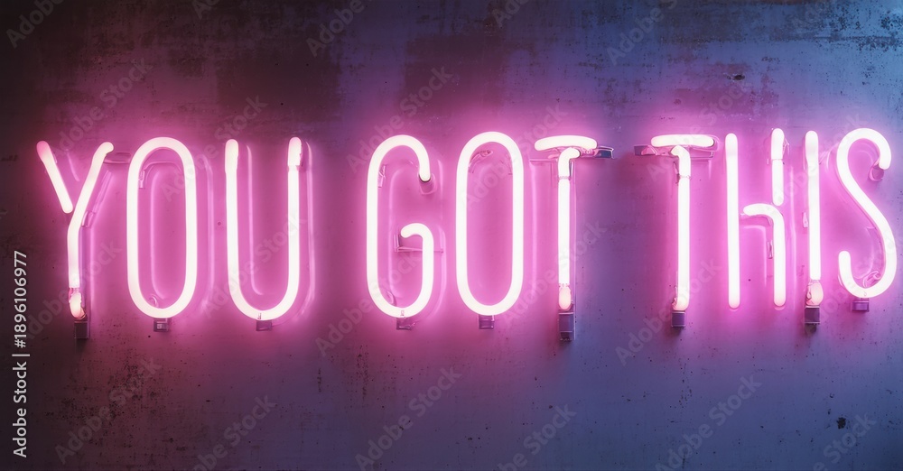 Fototapeta premium Bright pink neon sign displays positive message. Wall texture visible, dark background creates contrast. Inspiring, motivational text.