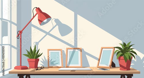 Desk with plants, frames, lamp, and phone near a window