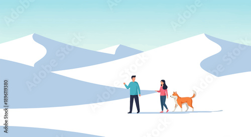 Couple with dog walking in a snowy landscape