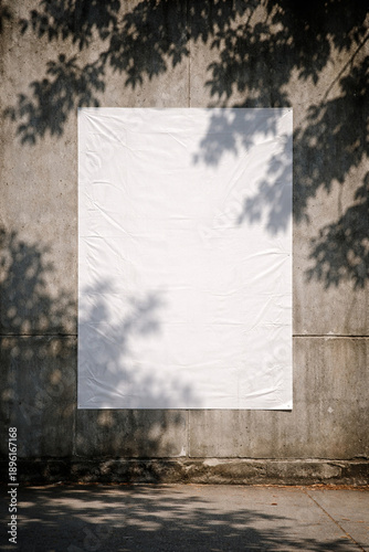 Glued wrinkled paper mockup on a rough urban wall, outdoor advertising template with copy space.
