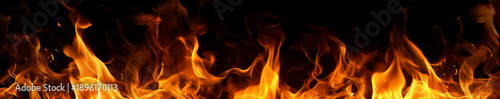 Fiery Inferno: A captivating display of intense flames, with dancing orange and yellow hues against a dark backdrop, creating a dramatic and mesmerizing spectacle.