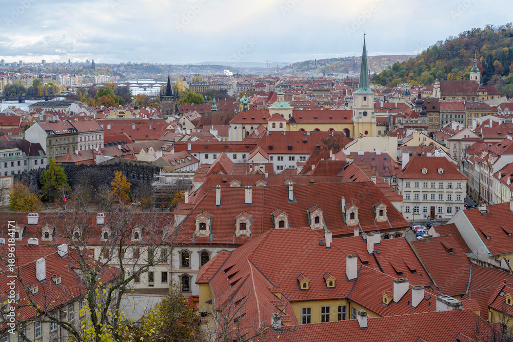 Obraz premium An elevated view over the rooftops of the Lesser Town in Prague