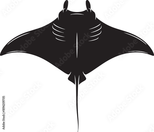 A striking black silhouette of a manta ray gracefully swimming forward