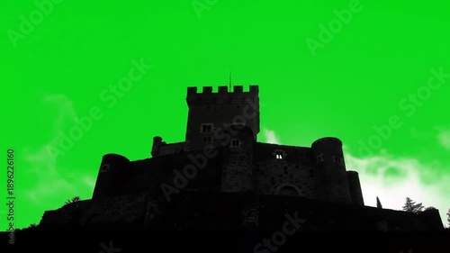 Silhouette of a castle against a green screen background