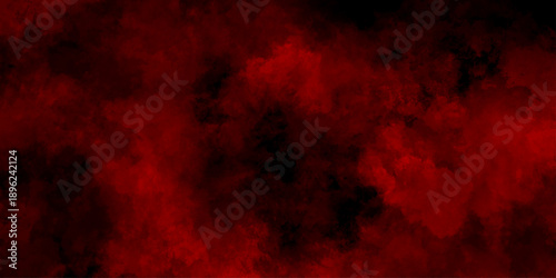 Abstract grunge red and black powder explosion cloud on black background. dark red smoke Like cloud wave effect on black. dark fire flame grunge texture background. toned fiery red sky.