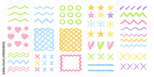 Colorful crayon scribbles and shapes arranged on a white background