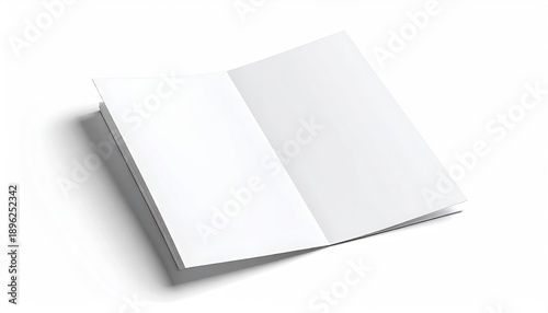 Opened blank booklet laying flat, white pages illuminated, shadow cast, studio shot