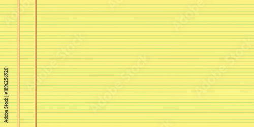 A close up view of lined yellow paper with a red margin