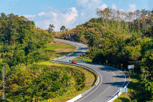 Foto High angle view of the famous Road Number 3 winding through lush green mountains in Nan, Thailand