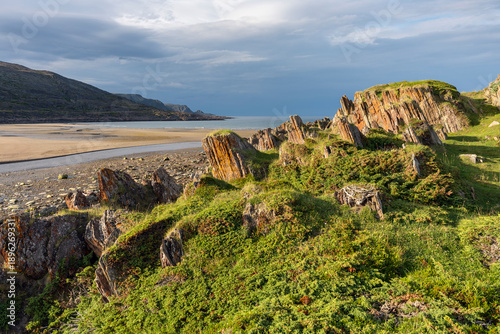 Sharp rock formations by the Barents Sea in Varanger, Northern Norway