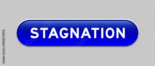 Blue color capsule shape button with word stagnation on gray background
