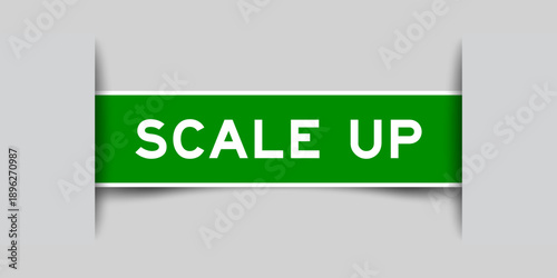 Green color square shape sticker label with word scale up inserted in gray background