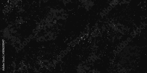 Dark abstract texture with subtle light variations and grainy background