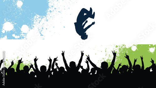 Silhouette of a Man Doing an Acrobat Backflip in the Air Above a Large Cheering Crowd with Artistic Blue and Green Paint Splatter Background