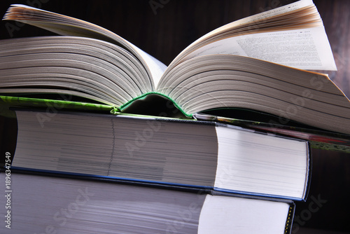 Fotografie Composition with open book on the table