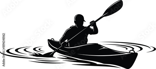 Kayaker paddling on calm water