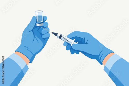 Healthcare professional hand filling syringe with vaccine for medical injection