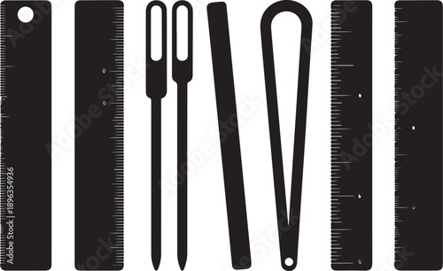 Black and white sewing needles and pins on white background