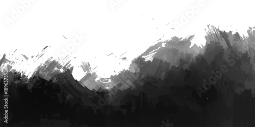 Panoramic view of a misty forest valley and mountain peaks under a soft morning sky at sunrise