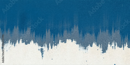 Abstract blue grunge background featuring a vintage paint texture with cold frost patterns and a dirty art splash design resembling winter ice on an old wall