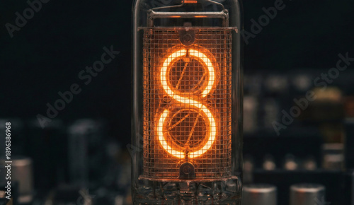 Glowing orange neon Nixie tube digit displaying number 8 close up