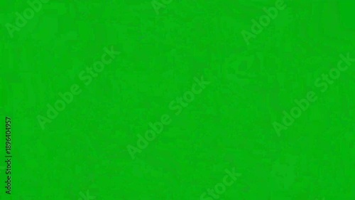 Abstract geometric shapes floating on green background with copy space