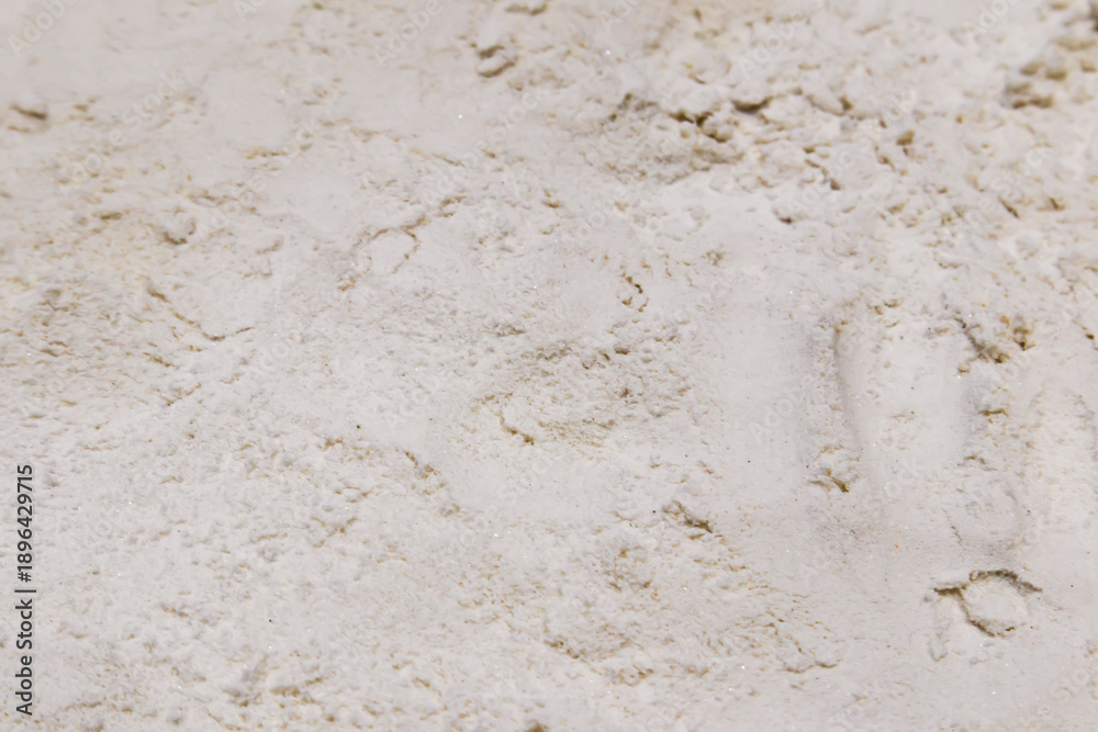 Fototapeta premium White sand on the beach focus view
