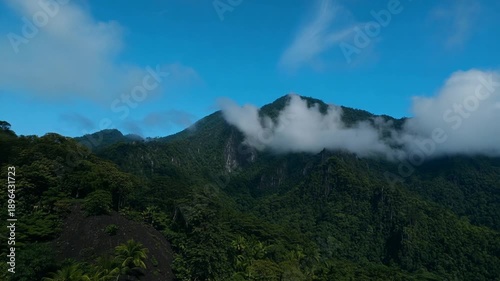 Wallpaper Mural Lush Tropical Mountain Landscape with Clouds and Blue Sky in the Seychelles Torontodigital.ca