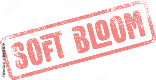 Distressed red rubber stamp displaying soft bloom text indicating gentle growth or delicate blossoming