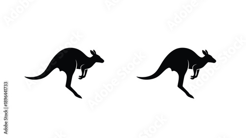 Two kangaroos in motion a striking black silhouette