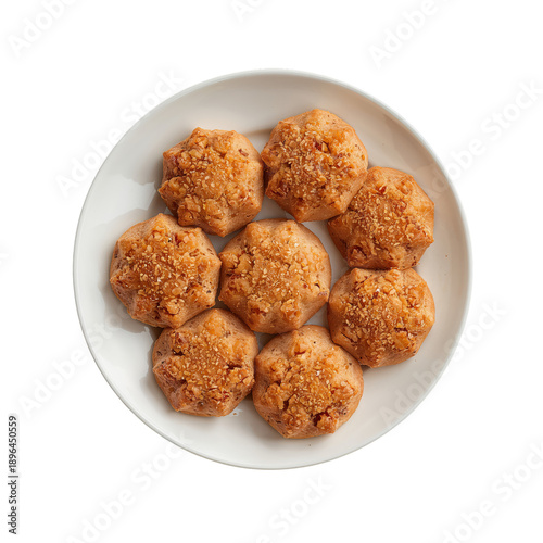 Dumplings Served in a Bowl With Sauce and Garnish at an Asian Restaurant Duri...