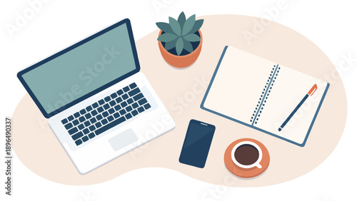 Modern workspace setup with laptop, notebook, and coffee