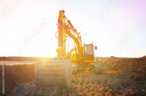 Billede på lærred Excavator earthworks on construction site