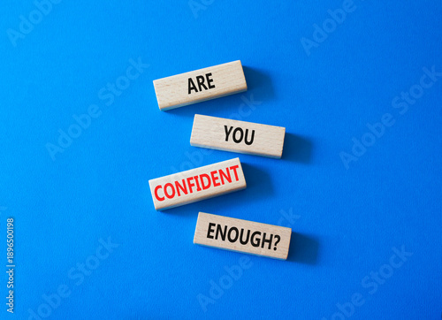 Confidence symbol. Concept words Are you confident enough wooden blocks. Beautiful bright blue background. Business and Are you confident enough concept. Copy space.
