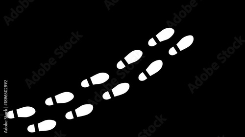 Abstract human shoes footstep walking animation. White color footprints shoes, shoe prints marks feet animated on black background. 4k video