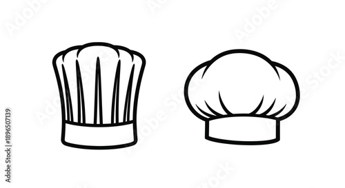 Two chef hats depicted in a stark black silhouette