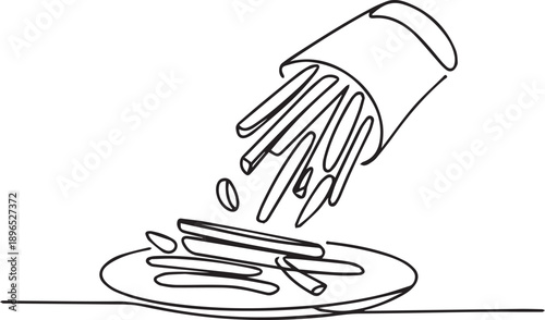 Pills spilling from a bottle onto a plate on a flat surface viewed from the side