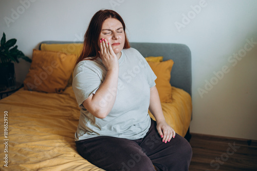Frustrated woman with tooth ache for dental issue, jaw infection or gum disease at home. Female person, decay or sore teeth in discomfort for mouth cavity, illness or swollen abscess