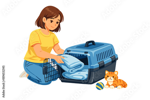 Woman puts blankets into pet carrier while cat sits beside her at home during daytime