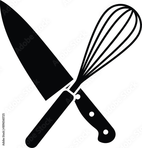 Chef knife and a wire whisk kitchen utensil. 