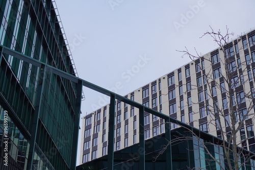 Buildings and structure viewed from ground level in an urban area during daylight