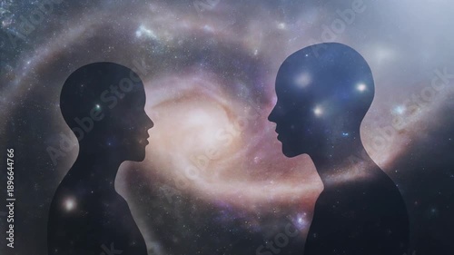 Two cosmic human silhouettes facing each other against a swirling galaxy background, representing consciousness and universal connection.