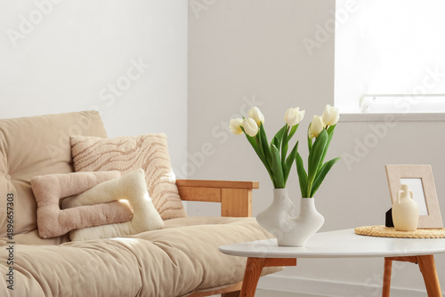 Vase with white tulips for ...